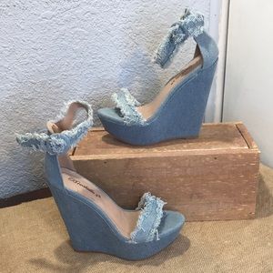 Breckelle’s distressed jean ankle strap wedge heels